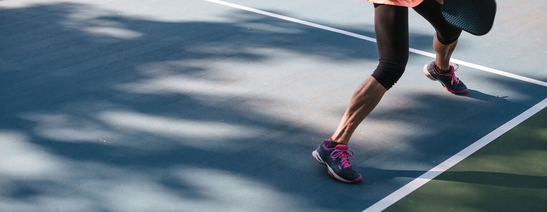 a person playing Pickleball