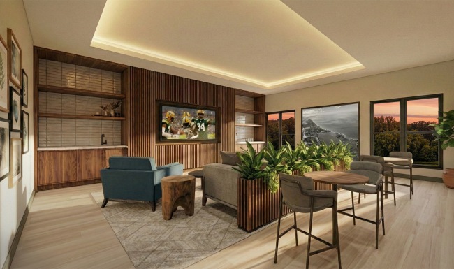 a clubroom with a couch, chairs and a tv